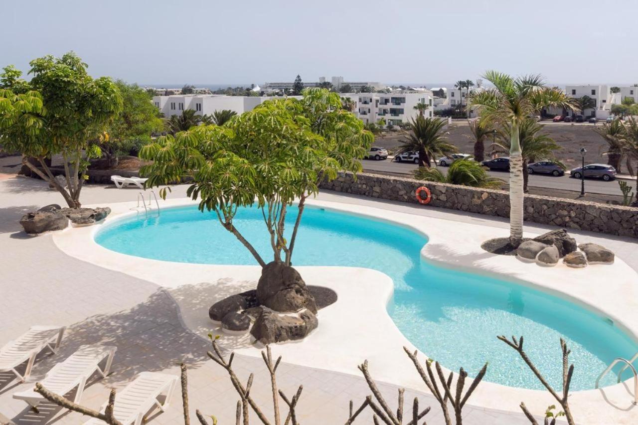 Apartamento Om Con Piscina Y Vistas Al Mar Apartment Costa Teguise Bagian luar foto