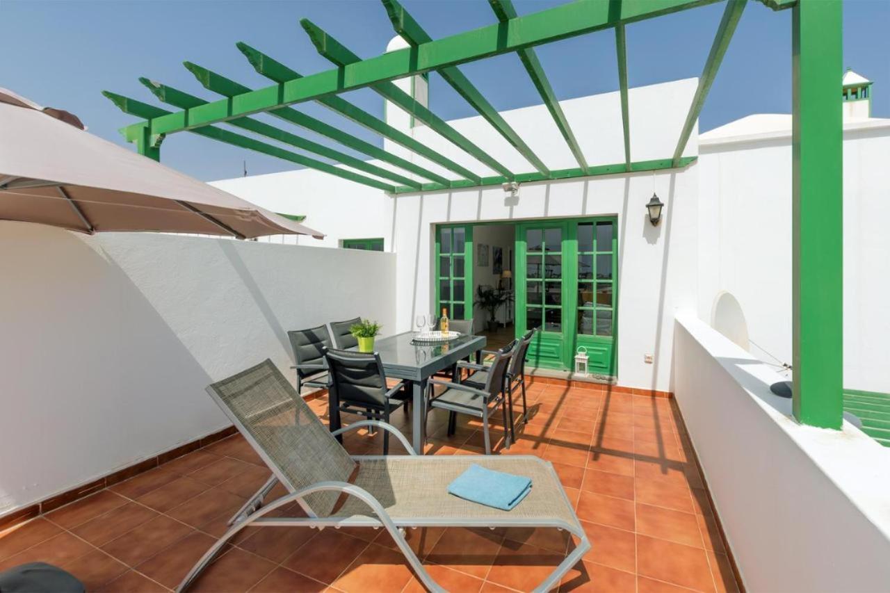 Apartamento Om Con Piscina Y Vistas Al Mar Apartment Costa Teguise Bagian luar foto