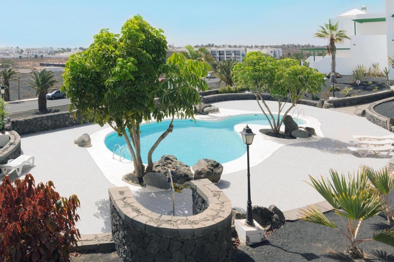 Apartamento Om Con Piscina Y Vistas Al Mar Apartment Costa Teguise Bagian luar foto